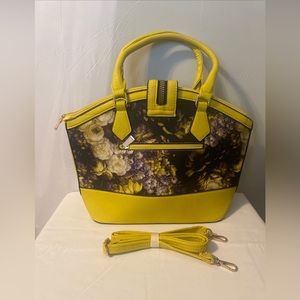 Beautiful yellow, black and white faux leather purse with an adjustable strap